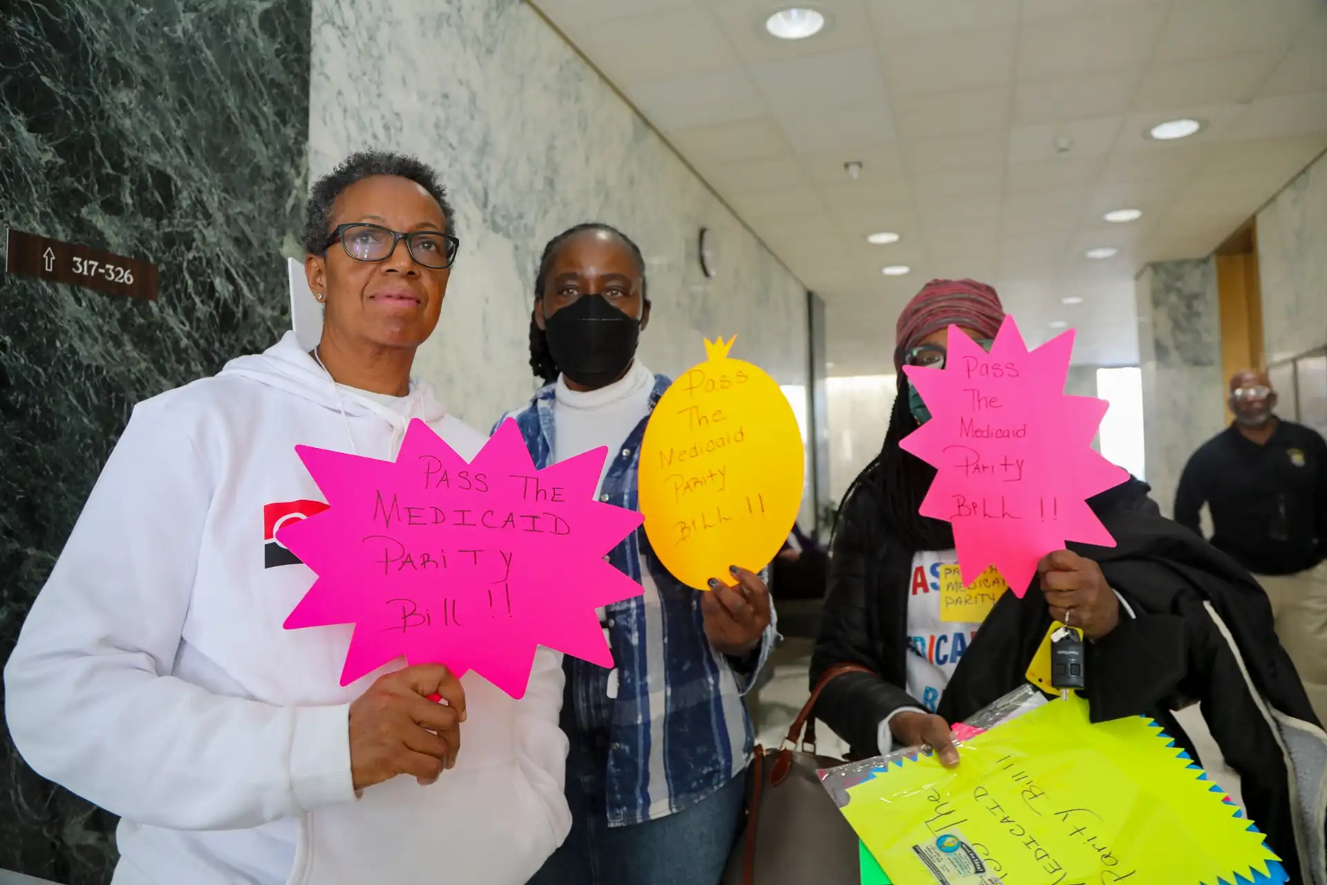 medicaid-parity-advocates-DhBgS6zU